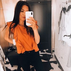 Burnt orange ruffle top